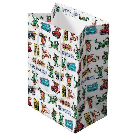 Gremlins™ Sticker-Spaß-Muster Mittlere Geschenktüte (Vorderseite Schrägansicht)