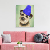 Grenzer Terrier mit blauem Bobble Hat Leinwanddruck (Insitu (Wohnzimmer))