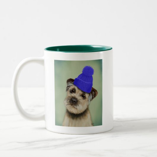 Grenzer Terrier mit blauem Bobble Hat Zweifarbige Tasse (Links)