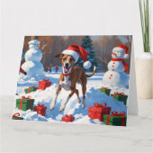 Greyhound läuft im Schnee mit Weihnachtshut Karte (Vorderseite)