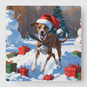 Greyhound läuft im Schnee mit Weihnachtshut Quadratische Wanduhr