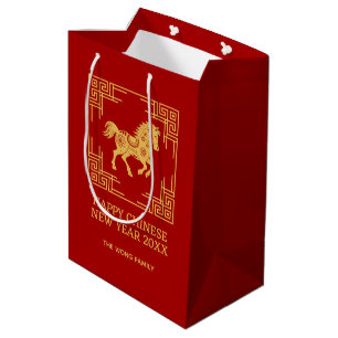Griechischer Ornamentrahmen mit goldenem Pferdemus Mittlere Geschenktüte