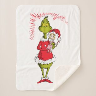 Grinch hält Cindy Lou Who fest Sherpadecke