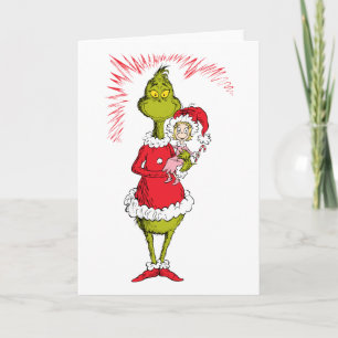 Grinch hält Cindy Lou Who Karte