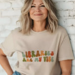 Groovy Retro Libraries sind mein Gesicht, biblisch Tri-Blend Shirt<br><div class="desc">'Libraries Are My Vibe' T - Shirt im Retro-Stil für Bibliothekare,  Archivisten und Bibliotheksassistenten.</div>