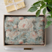 Große, blassrosa Zinnspitzen im blau-grünen Hinter Seidenpapier (Geschenk)