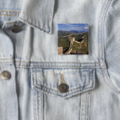 Große Mauer, die sich durch den Berg zieht, Button (Beispiel)