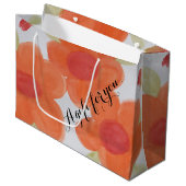 Große orangefarbene Bag Große Geschenktüte (Vorderseite Schrägansicht)