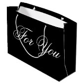 Große schwarze Designer Papiergeschenktasche Geschenktüte (Rückseite Schrägansicht)