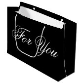 Große schwarze Designer Papiergeschenktasche Große Geschenktüte (Vorderseite Schrägansicht)