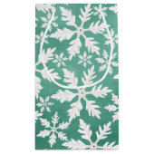 Große weiße Schneeflocken fallen ins Grüne Kleine Geschenktüte (Rückseite)