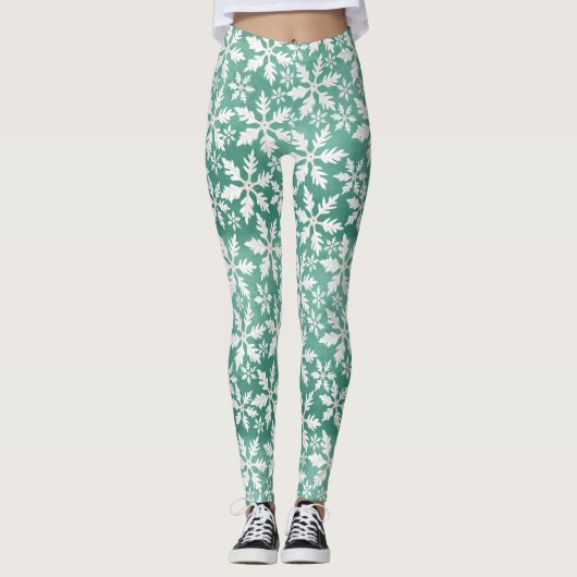 Große weiße Schneeflocken fallen ins Grüne Leggings (Vorderseite)