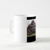 Großer Affe, der sich hinsitzt Kaffeetasse (Vorderseite Links)