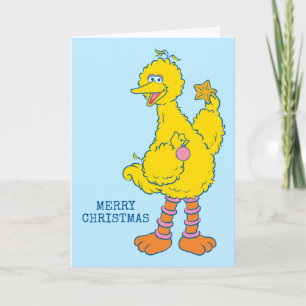 Großer Vogel hält Weihnachtsbaumschmuck Karte