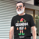 Großvater-Elf-Familie, passend zu Weihnachten, Nam T-Shirt<br><div class="desc">Erleben Sie den Urlaubssgeist mit diesem tollen Opa-Elf-T - Shirt, der Teil einer passenden Kollektion von Elf-Outfit für Familien ist und Geschenke für alle Familienmitglieder enthält. Dieser T - Shirt ist perfekt für jede Weihnachtsfamilie geeignet und verfügt über einen niedlichen Elfenhut und lustige Beine, mit der Beschriftung "Opa elf" in...</div>