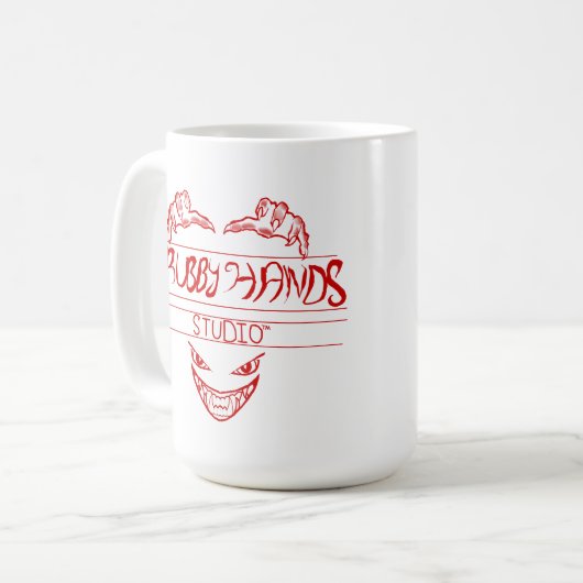 Grubby Handstudio Logo + Motto-Tasse Kaffeetasse (Vorderseite Links)