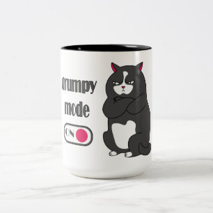 Grumpiger Modus bei lustiger, dicker Katze Zweifarbige Tasse