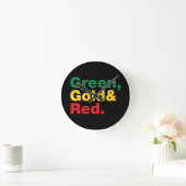 Grün, Gold und Rot. Runde Wanduhr (Zuhause)