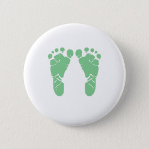 Grüne Babyabdrücke Button