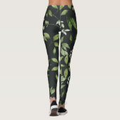 grüne Blätter auf schwarzem Hintergrund Leggings (Rückseite)