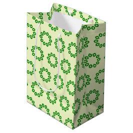 Grüne Blätter in einem gelben Kreis Mittlere Geschenktüte