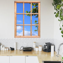 Grüne Blätter und Sommerhimmelansicht aus einem Fe