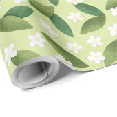 Grüne Blätter und weiße Blume über den grünen Hint Geschenkpapier (Rolleneckpunkt)