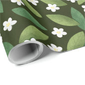 Grüne Blätter und weiße Blume über den grünen Hint Geschenkpapier (Rolleneckpunkt)