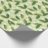 Grüne Blätter und weiße Blume über den grünen Hint Geschenkpapier (Ecke)