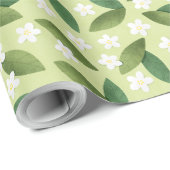 Grüne Blätter und weiße Blume über den grünen Hint Geschenkpapier (Rolleneckpunkt)