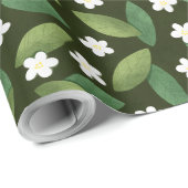 Grüne Blätter und weiße Blume über den grünen Hint Geschenkpapier (Rolleneckpunkt)