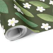 Grüne Blätter und weiße Blume über den grünen Hint Geschenkpapier (Rolleneckpunkt)