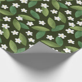 Grüne Blätter und weiße Blume über den grünen Hint Geschenkpapier (Ecke)