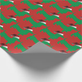 Grüne Dackel mit einem Weihnachtshut Geschenkpapier (Ecke)