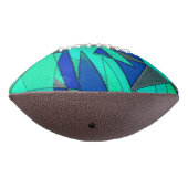 Grüne dreieckige Ausschnitte auf blauem Hintergrun Football (Gedreht 270)