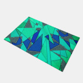 Grüne dreieckige Ausschnitte auf blauem Hintergrun Fußmatte (Schrägansicht)