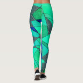 Grüne dreieckige Ausschnitte auf blauem Hintergrun Leggings (Rückseite)