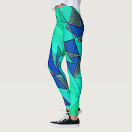 Grüne dreieckige Ausschnitte auf blauem Hintergrun Leggings