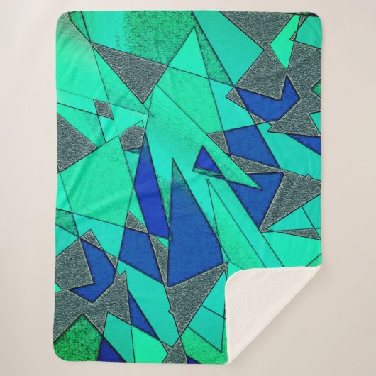 Grüne dreieckige Ausschnitte auf blauem Hintergrun Sherpadecke (Vorderseite)