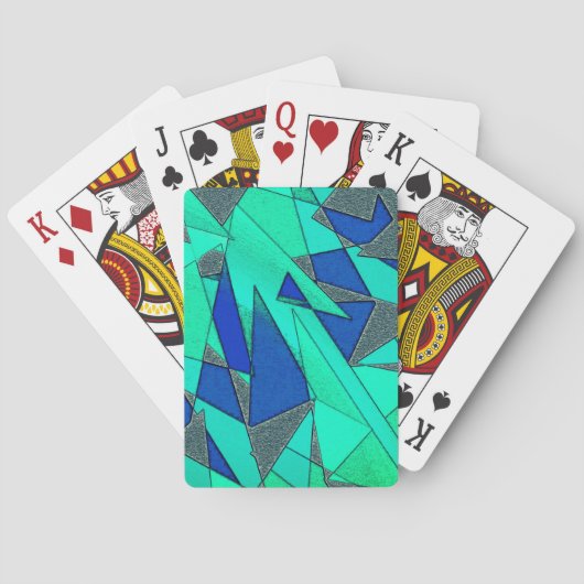 Grüne dreieckige Ausschnitte auf blauem Hintergrun Spielkarten (Rückseite)