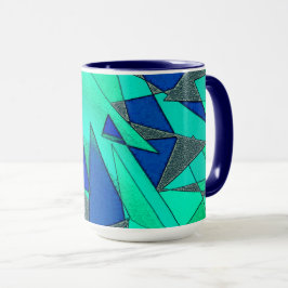 Grüne dreieckige Ausschnitte auf blauem Hintergrun Tasse