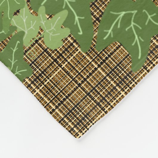 Grüne Efeu auf goldbraunem kariert Fleecedecke (Ecke)