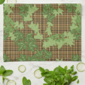 Grüne Efeu auf goldbraunem kariert Geschirrtuch (Gefaltet)