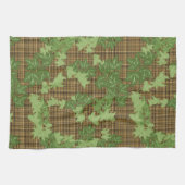 Grüne Efeu auf goldbraunem kariert Geschirrtuch (Horizontal)