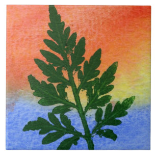 Grüne Farbe auf mehrfarbigem Papier Fliese