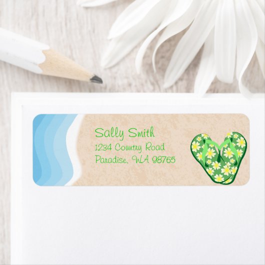 Grüne Flip Flops auf dem Strandlabel (Insitu)