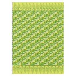 Grüne Formulare auf einem Tableclout Tischdecke