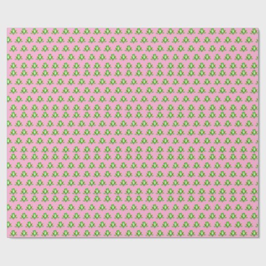 grüne Frösche auf rosa Geschenkpapier (Flach)