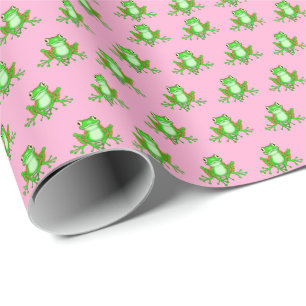grüne Frösche auf rosa Geschenkpapier