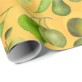 Grüne Früchte auf orangefarbenem Hintergrund Geschenkpapier (Rolleneckpunkt)